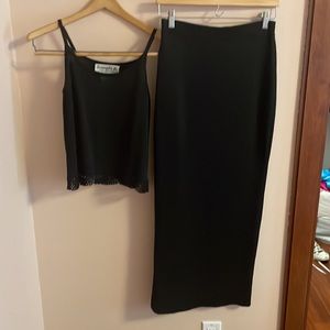 Joseph A. Metallic black tank top paired with a metallic black maxi skirt.